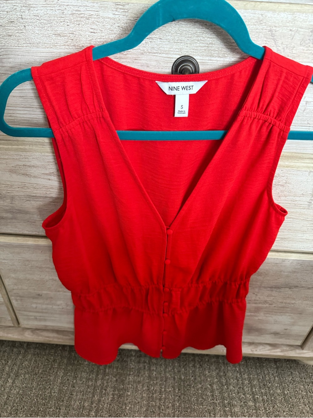 Nine West Bright Red Sleeveless V‑Neck Peplum Blouse